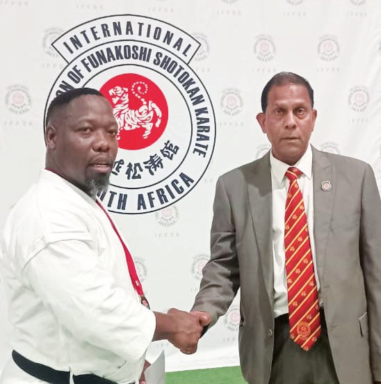 Sensei Matthews Mpolokeng Motsi (left), instructor of Luka Dojo-Ka, led the team to a proud 16-medal finish and earned two gold medals himself.